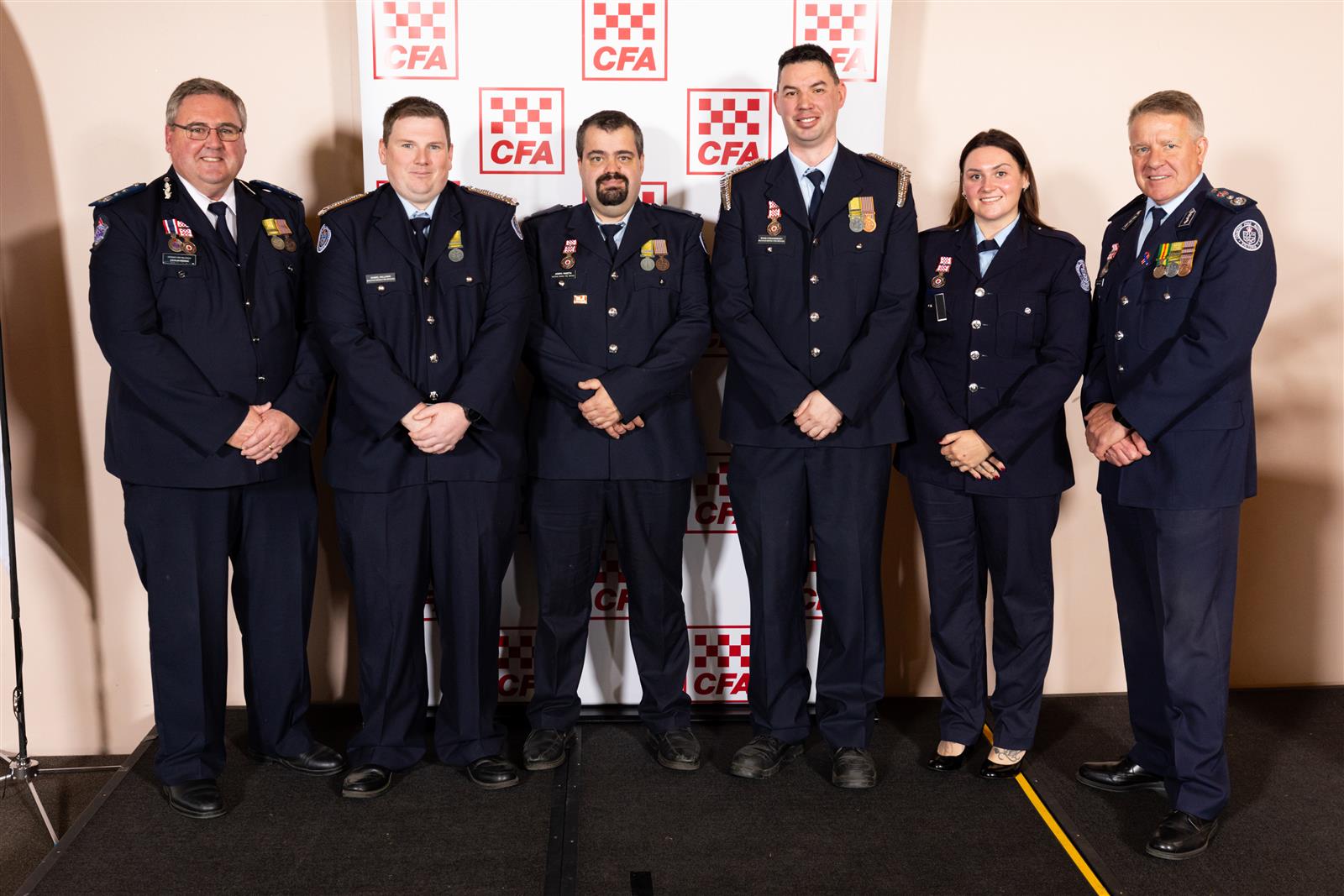 Bacchus Marsh Fire Brigade members with ACFO Lachlan Redman and Acting Chief Officer Garry Cook. Credit: Uniform Photography